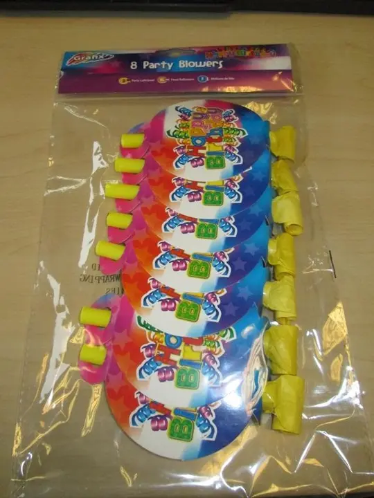 Photo from the official notice: Grafix Party blowers — choking risk
