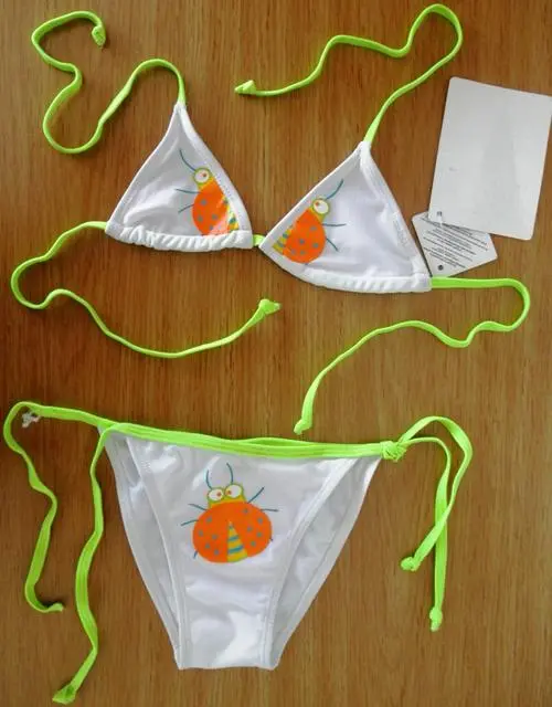 Photo de l’avis officiel: Rosa Bikini de fille — risque: Blessures & Etranglement