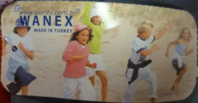Foto uit de officiële melding: Wanex Kinder trainingspak bodem — risico: Verwonding