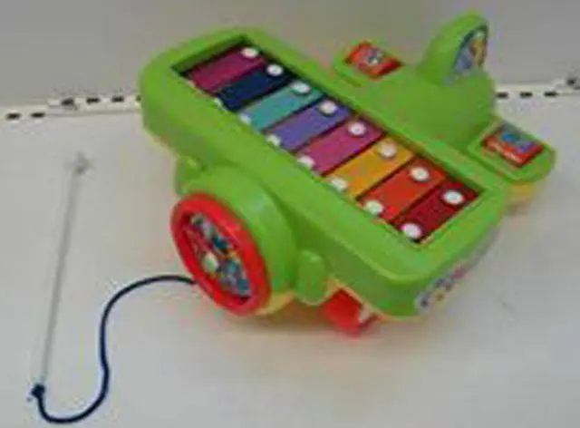 Foto do aviso oficial: New Styles Musical Plane "Musician" Brinquedo musical com xilofone — risco: Engasgamento