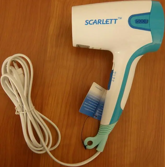 Foto do aviso oficial: Scarlett Secador de cabelo — risco: Choque elétrico