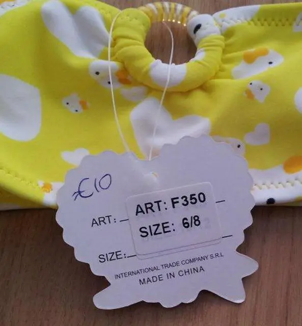 Foto dell’avviso ufficiale: Power Flower Bikini per ragazze — rischio: Lesioni & Strangolamento (A12/1292/13)