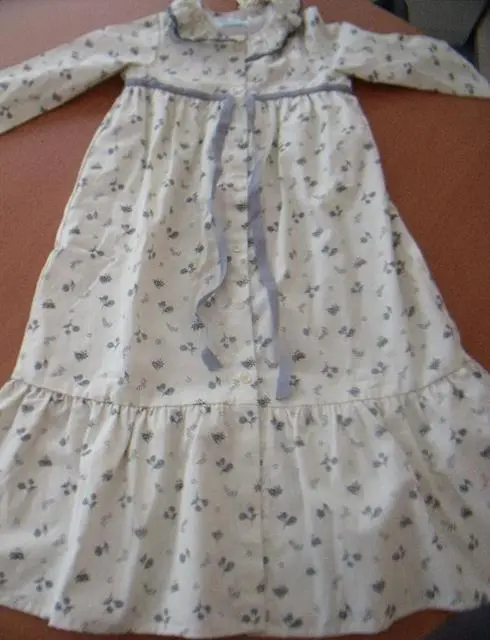 Photo de l’avis officiel: Coquelicot Robe de fille — risque: Blessures