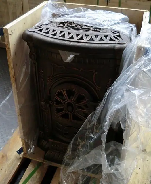 Photo from the official notice: Ambra solid fuel stove — burns & fire risk