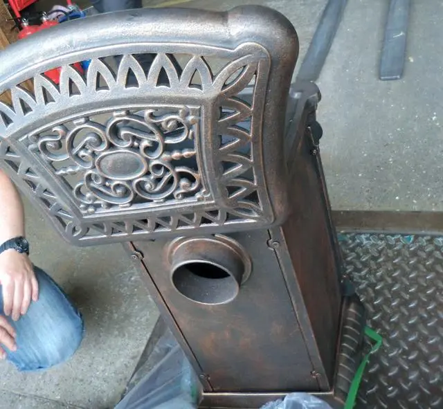 Photo from the official notice: Ambra solid fuel stove — burns & fire risk