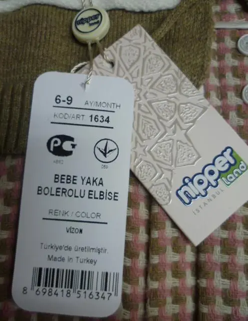 Photo de l’avis officiel: Nipper Land Ensemble de vêtements pour filles — risque: Etranglement