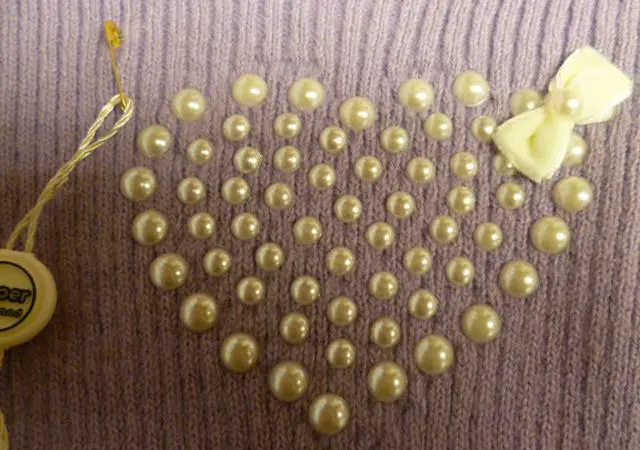 Foto aus der offiziellen Meldung: Nipper Land Pullover für Mädchen — Risiko: Ersticken