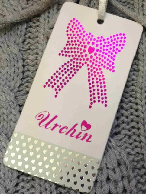 Foto dell’avviso ufficiale: Urchin Abito da ragazza — rischio: Strangolamento (A12/1554/13)