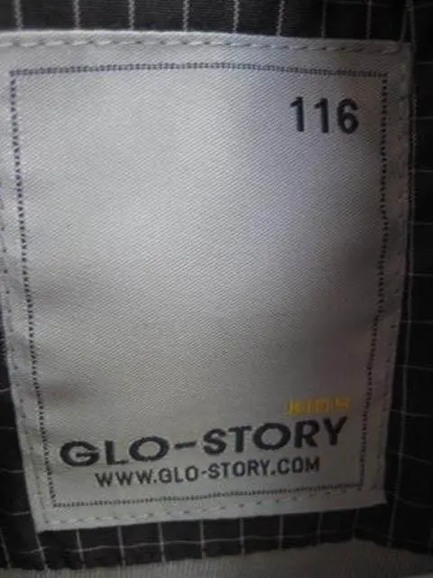 Foto uit de officiële melding: GLO-STORY Kinderjas — risico: Verwurging