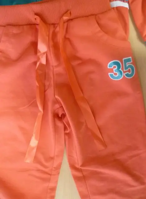 Foto uit de officiële melding: Raman Kinderkleding — risico: Verwonding & Verwurging