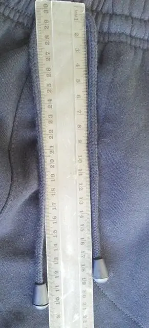 Foto uit de officiële melding: Action gear Kinderkleding set — risico: Verwonding & Verwurging