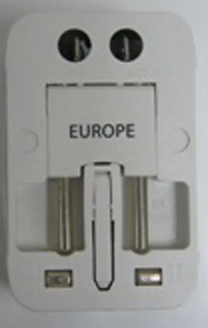 Foto do aviso oficial: International Adaptor Adaptador de plugue — risco: Choque elétrico