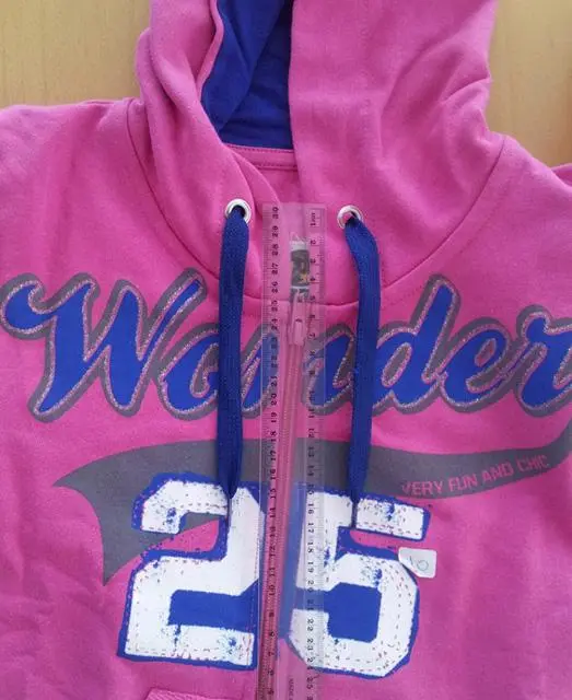 Foto uit de officiële melding: Prod Kinderkleding set — risico: Verwurging