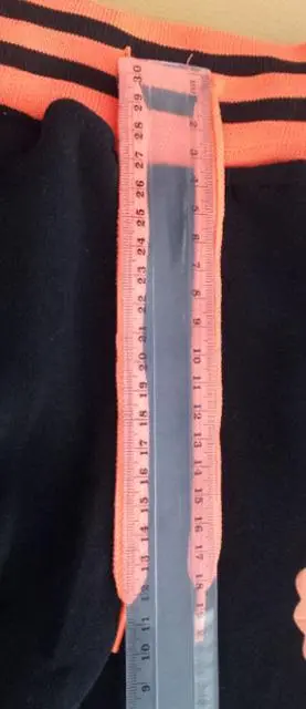 Foto uit de officiële melding: New Fashion Kinderkleding set — risico: Verwonding & Verwurging
