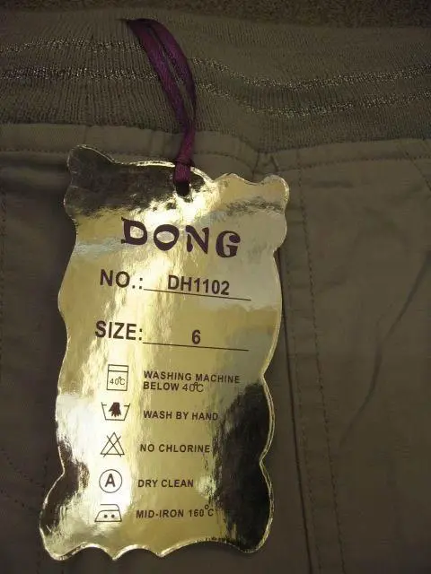 Photo de l’avis officiel: Dong Pantalons pour filles — risque: Blessures