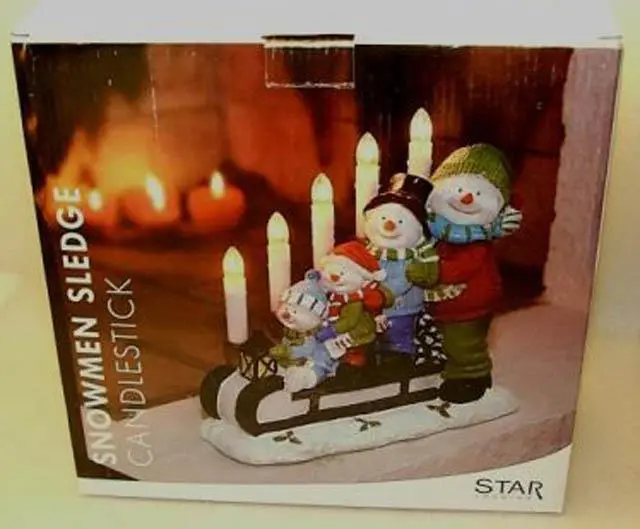 Foto do aviso oficial: Star Trading Snowmen Sledge Candlestick Luz de Natal — risco: Choque elétrico
