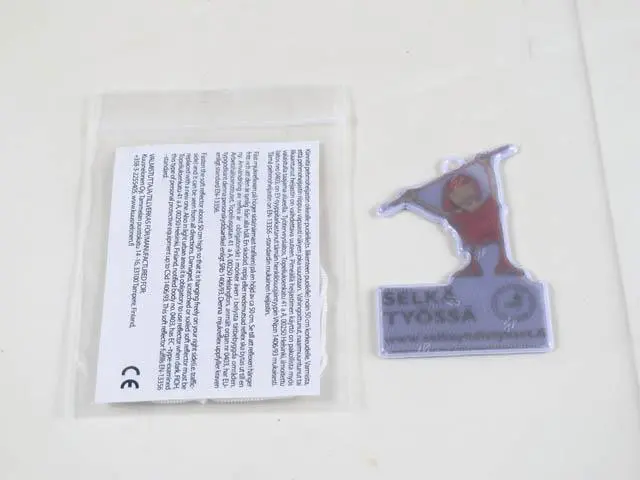 Foto do aviso oficial: Kuusnelonen Oy Refletor de peões macio — risco: Ambiente
