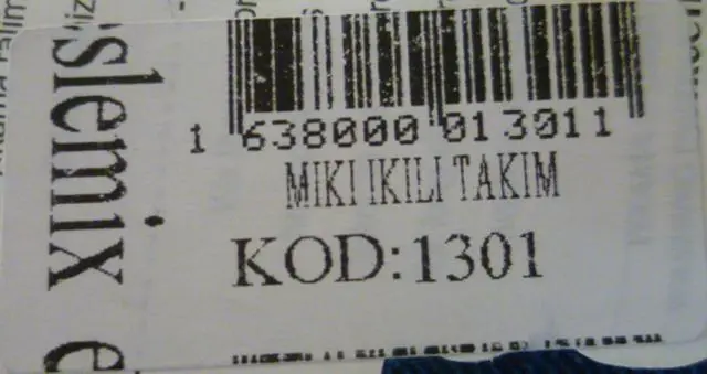 Foto uit de officiële melding: ESLEMIX Kinderkleding set — risico: Verwurging