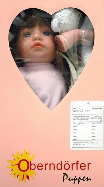 Photo from the official notice: Oberndoerfer Puppen Celina plastic doll — choking & cuts risk