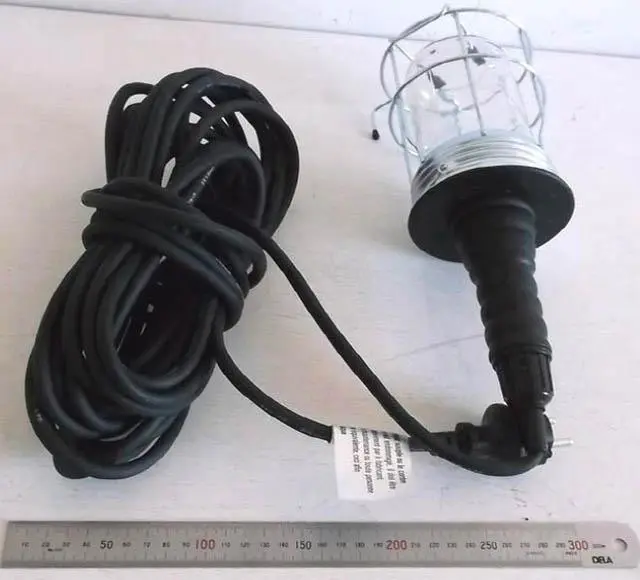 Photo de l’avis officiel: Merci Lampe portable — risque: Choc électrique