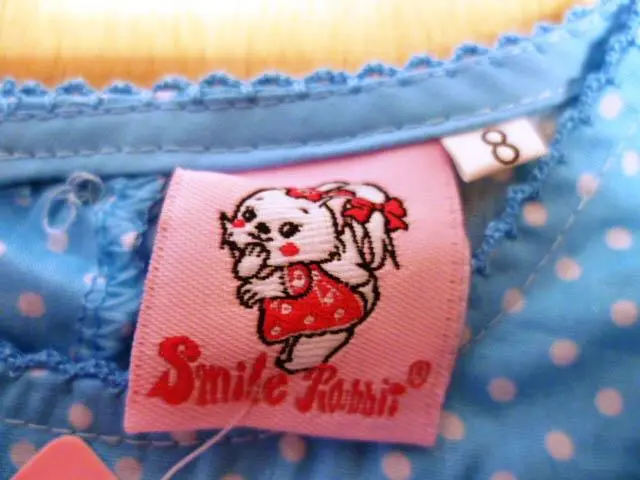 Photo de l’avis officiel: Smile Rabbit Robe d’enfant — risque: Blessures (A12/0786/14)