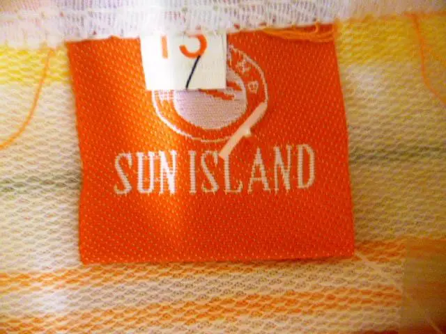 Foto uit de officiële melding: Sun Island Kinderkleding set — risico: Verwonding