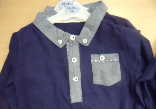 Foto aus der offiziellen Meldung: LITTLE REBEL Bluse für Babys — Risiko: Ersticken