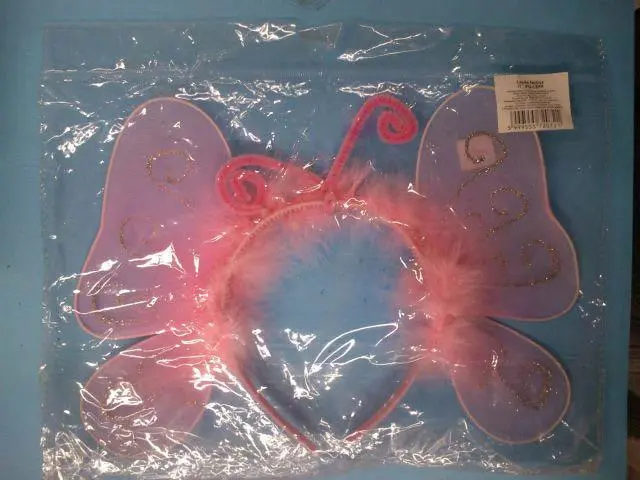 Photo de l’avis officiel: Lepke fejdísz ('butterfly headdress') Coiffe papillon — risque: Brûlures