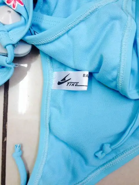 Photo de l’avis officiel: Yike Bikini des filles — risque: Blessures & Etranglement (A12/1041/14)