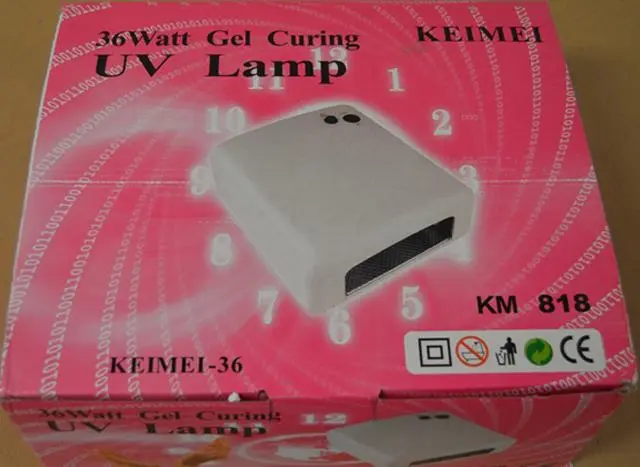 Foto do aviso oficial: KEIMEI 36 W Gel Curing UV Lamp KEIMEI-36 Lâmpada UV para unhas — risco: Choque elétrico