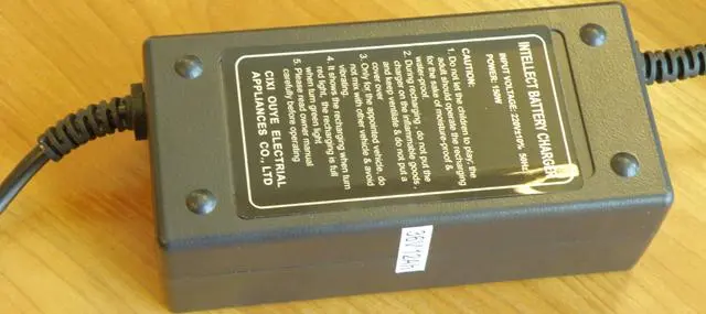 Foto do aviso oficial: Cixi Ouye Electrical Appliances Intellect Battery Charger / Universal Electric Bicycle Battery Charger Carrega — risco: Choque elétrico
