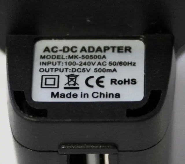 Foto do aviso oficial: AC/DC Adapter Adaptador — risco: Choque elétrico (A12/1156/14)