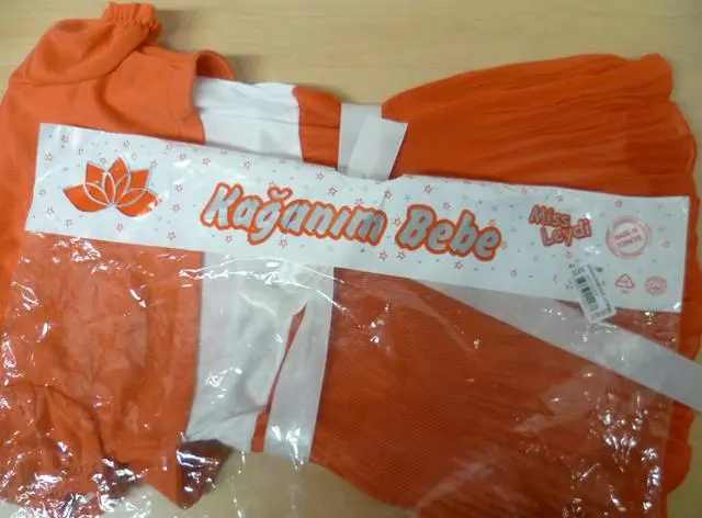 Foto uit de officiële melding: Kağanim Bebe Kinderkleding set — risico: Verwonding