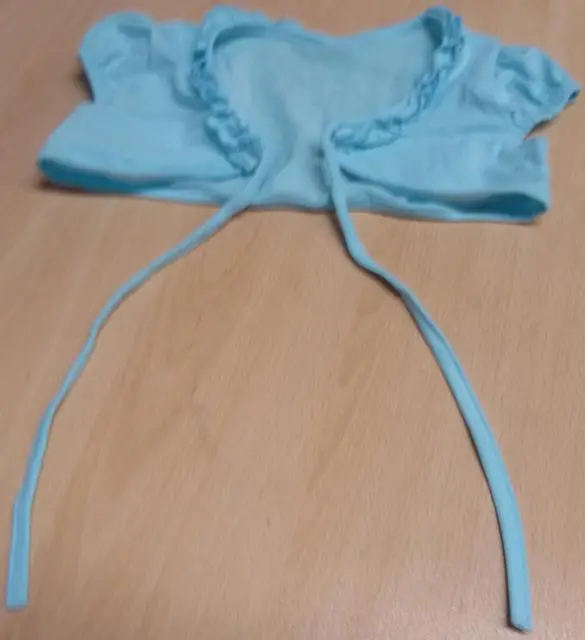 Foto uit de officiële melding: Quenny Kinderkleding set — risico: Verwurging