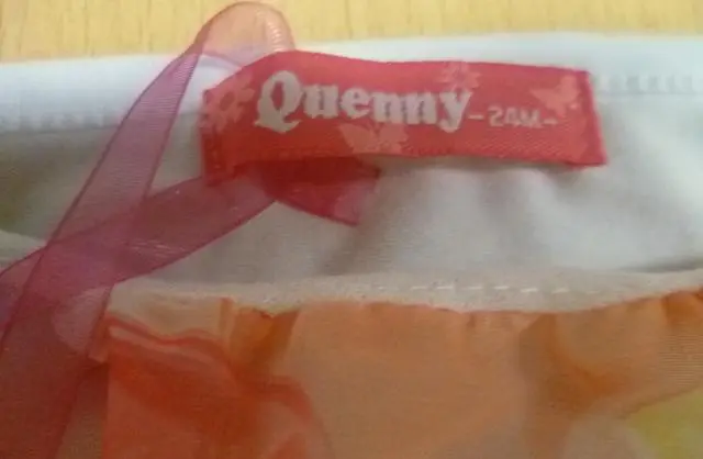 Foto uit de officiële melding: Quenny Kinderkleding set — risico: Verwurging