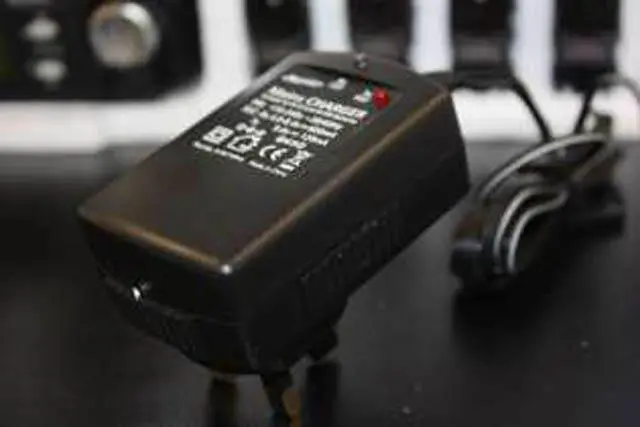 Photo from the official notice: Futaba 7C 2.4GHz Programming for Airplane and Helicopter Models remote control handset — electric shock & fire risk