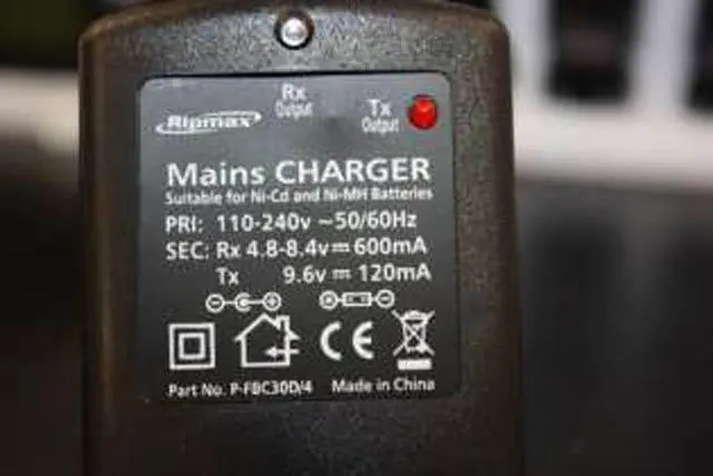 Photo from the official notice: Futaba 7C 2.4GHz Programming for Airplane and Helicopter Models remote control handset — electric shock & fire risk