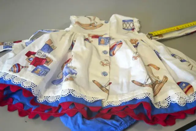 Foto uit de officiële melding: QUINPER Meisjes kleding set — risico: Verwonding