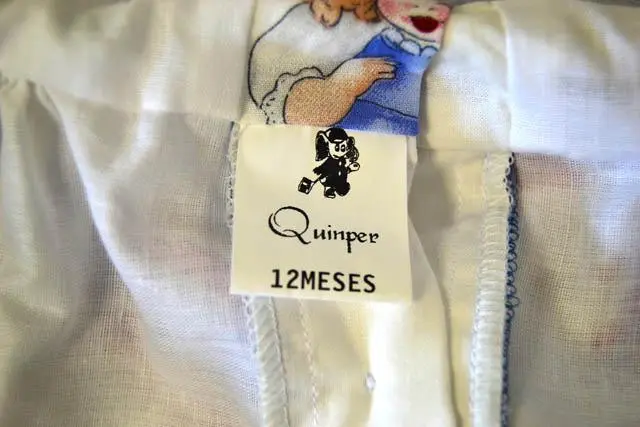 Foto uit de officiële melding: QUINPER Meisjes kleding set — risico: Verwonding