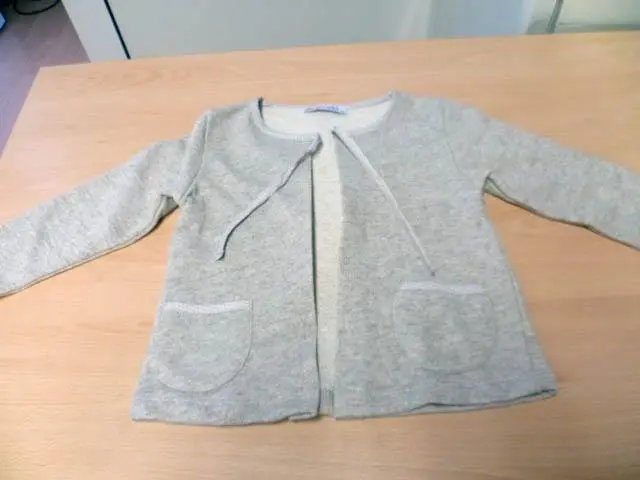 Foto uit de officiële melding: Unsea Kinderkleding set — risico: Verwurging