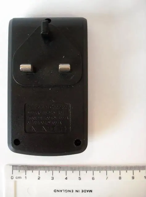 Photo de l’avis officiel: 3G Universal Charger Chargeur de batterie — risque: Choc électrique