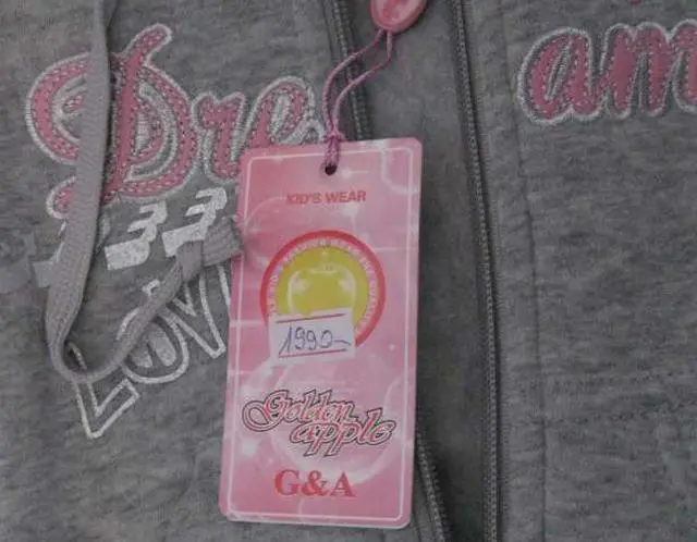 Foto do aviso oficial: Golden apple Pijama infantil — risco: Estrangulamento