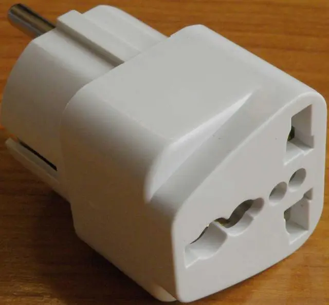Photo from the official notice: ADELEQ Universal Adaptor plug adaptor — electric shock risk