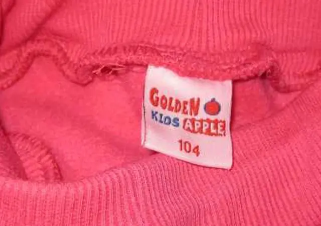 Foto uit de officiële melding: Golden apple Kinderkleding — risico: Verwonding & Verwurging