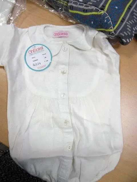 Photo from the official notice: OH! Soleil babies' clothes — choking risk
