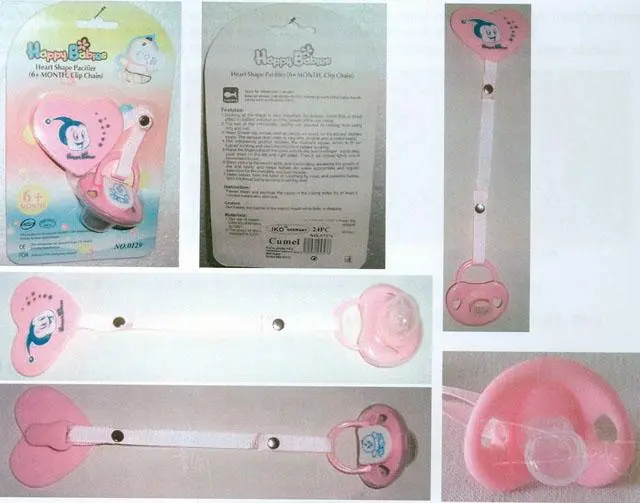 Foto aus der offiziellen Meldung: Iko Happy Babies Schnuller mit Halter — Risiko: Ersticken
