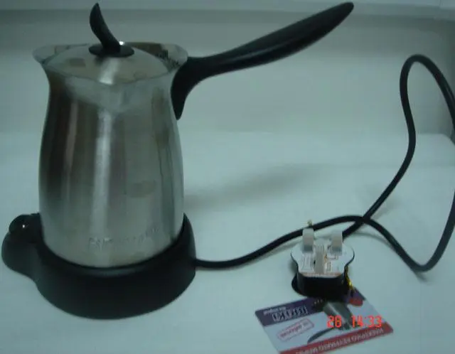 Photo de l’avis officiel: BRiKi Electric Cordless Coffee Maker Cafetière électrique — risque: Brûlures