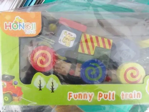 Foto do aviso oficial: HONGJI TOYS Funny Pull Train Comboio com blocos de empilhamento — risco: Engasgamento