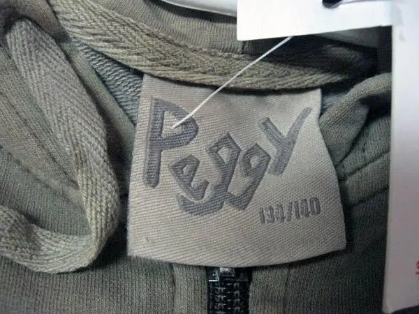 Foto do aviso oficial: Peggy Pijama infantil — risco: Estrangulamento