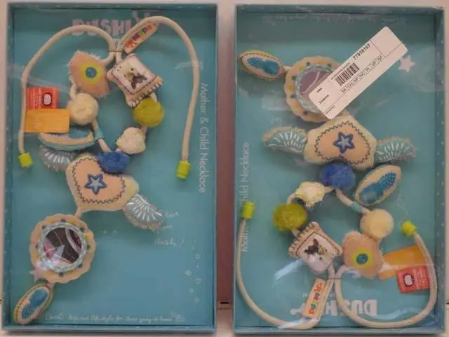 Photo de l’avis officiel: Dushi Mother and Child Necklace Collier de jouets — risque: Étouffement & Etranglement